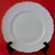 Suite of twelve table plates in white porcelain, golden lip