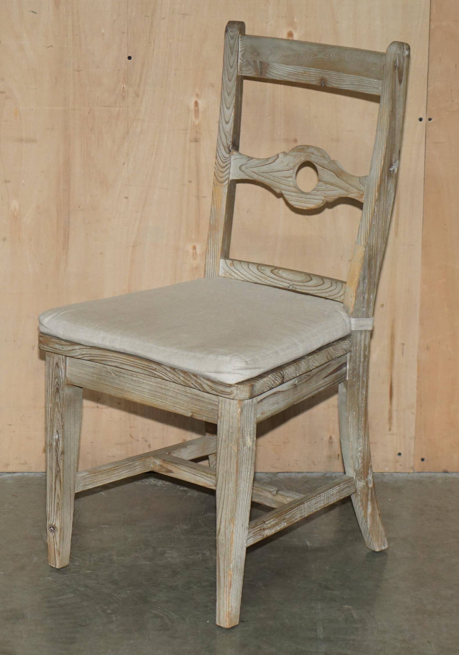 Pair of Swedish-style accent chairs in recycled pine with upholstered seats.