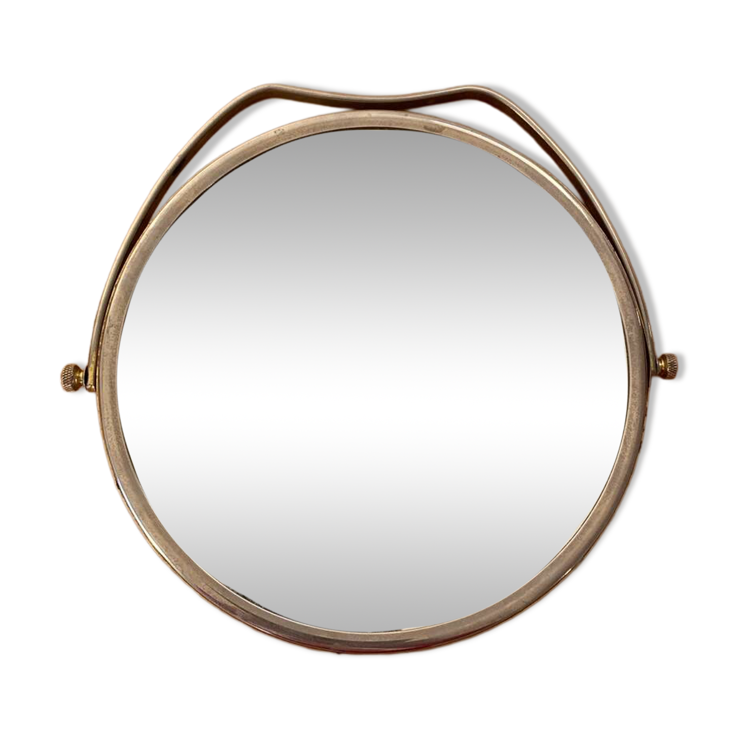 Miroir rond vintage en métal argenté.