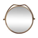Miroir rond vintage en métal argenté.