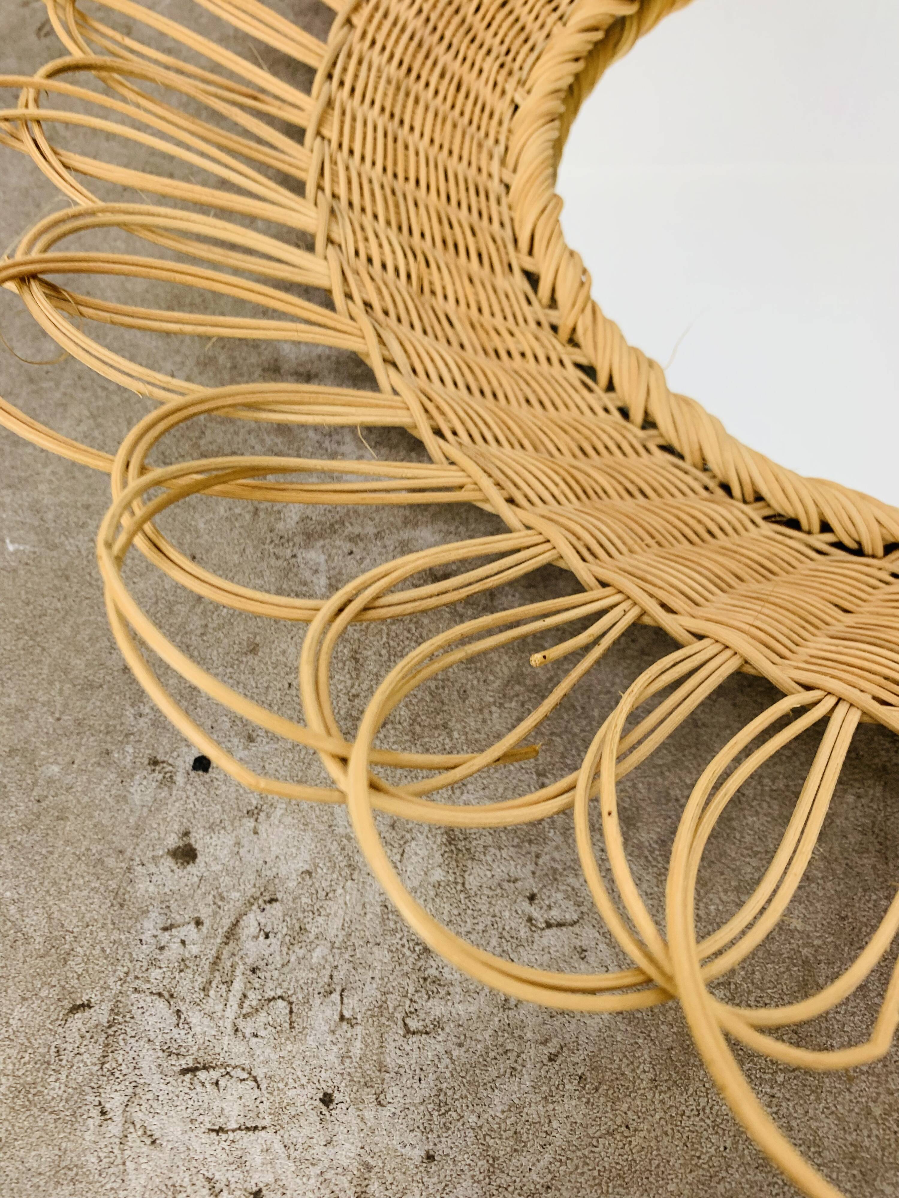 Vintage rattan sun mirror from the 60s