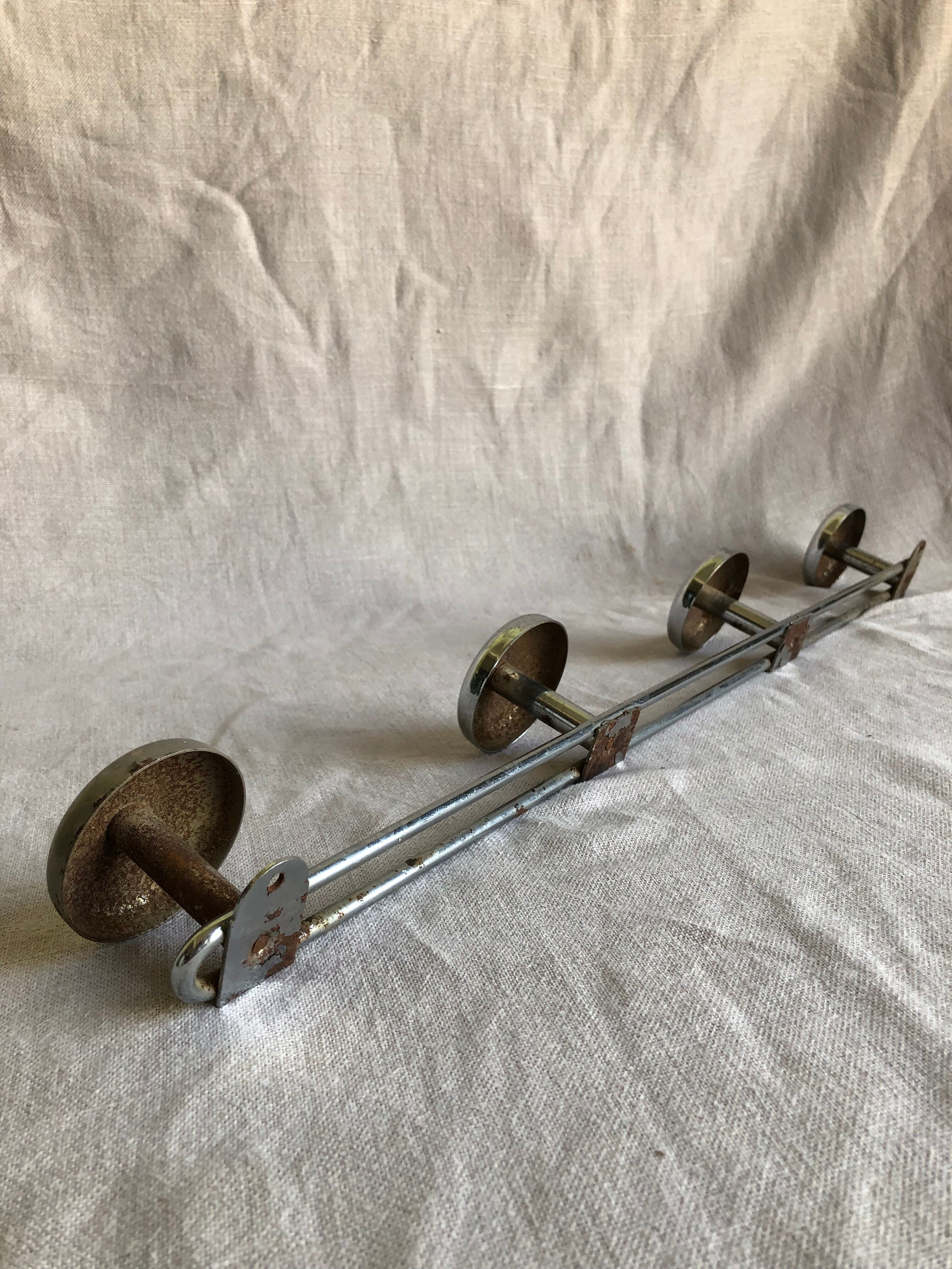 Metal wall coat rack