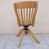 Swivel office chair in blond oak circa 1930