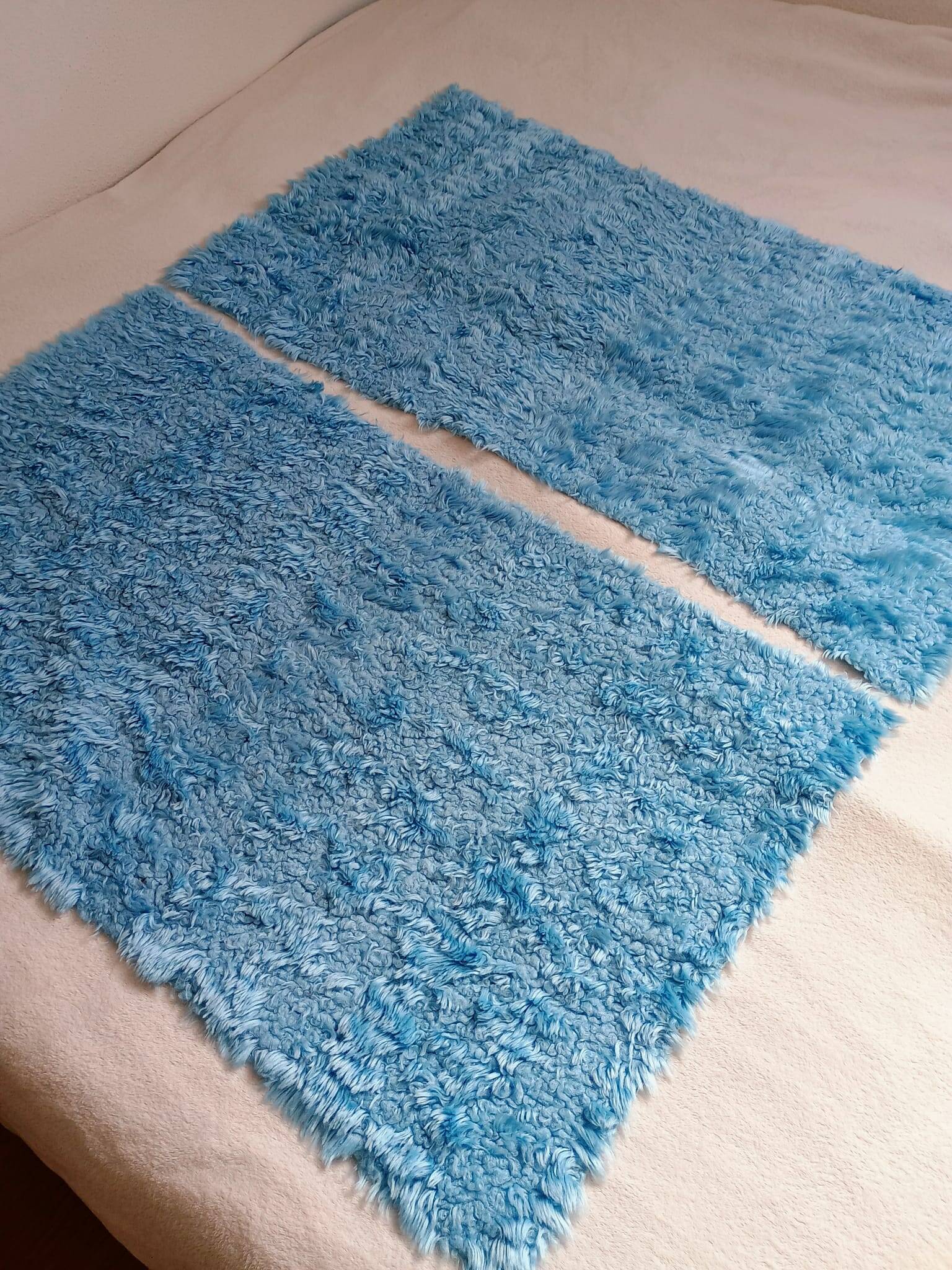 Set of two vintage sky blue rugs from the 70s