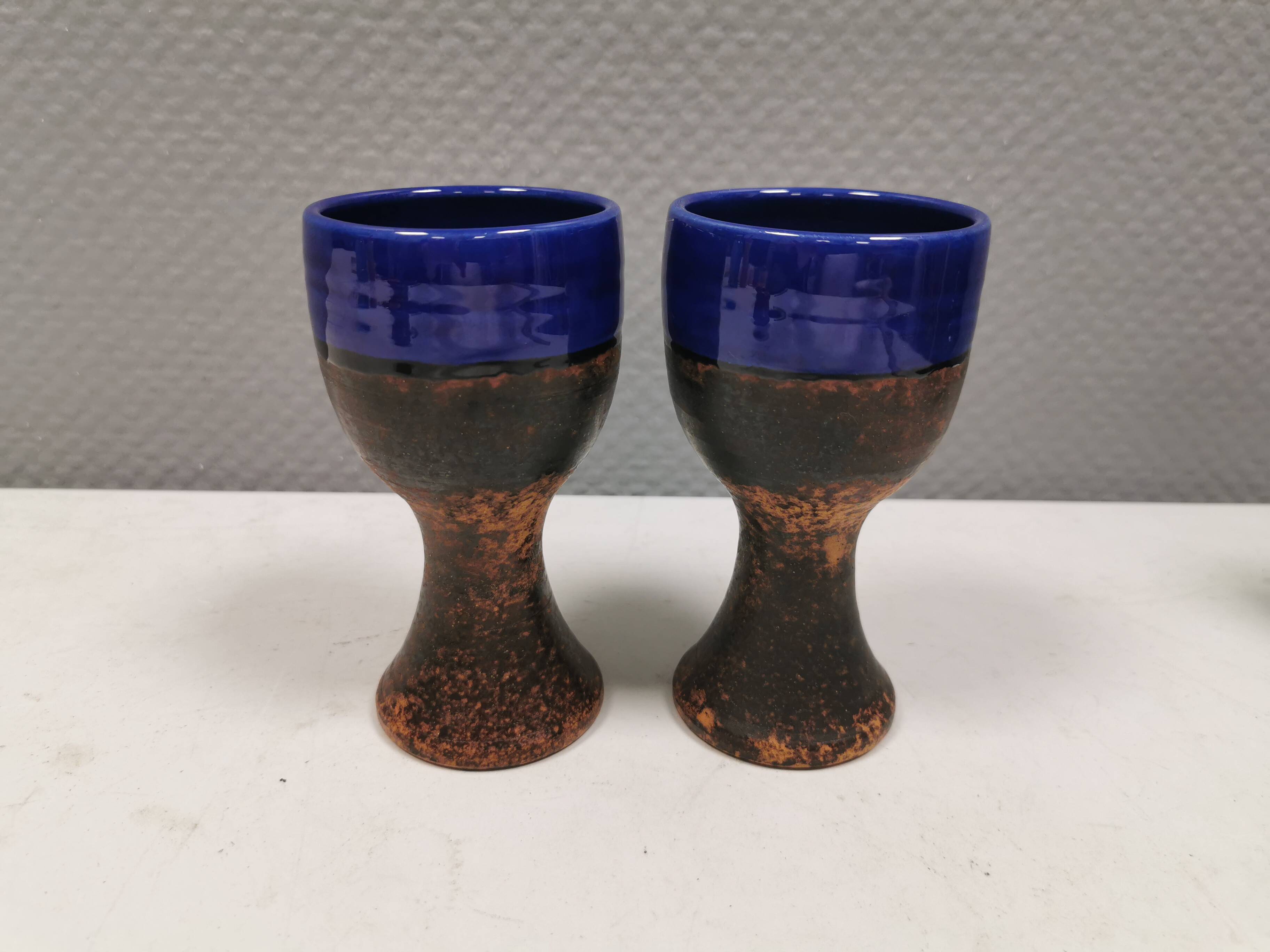 Two mugs in partially blue-glazed ceramic, from Seilast Wisby Sweden