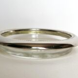 Three under silver-plated bottles