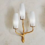 Pair of wall lights by Maison Arlus by Felix Agostini in bronze.
