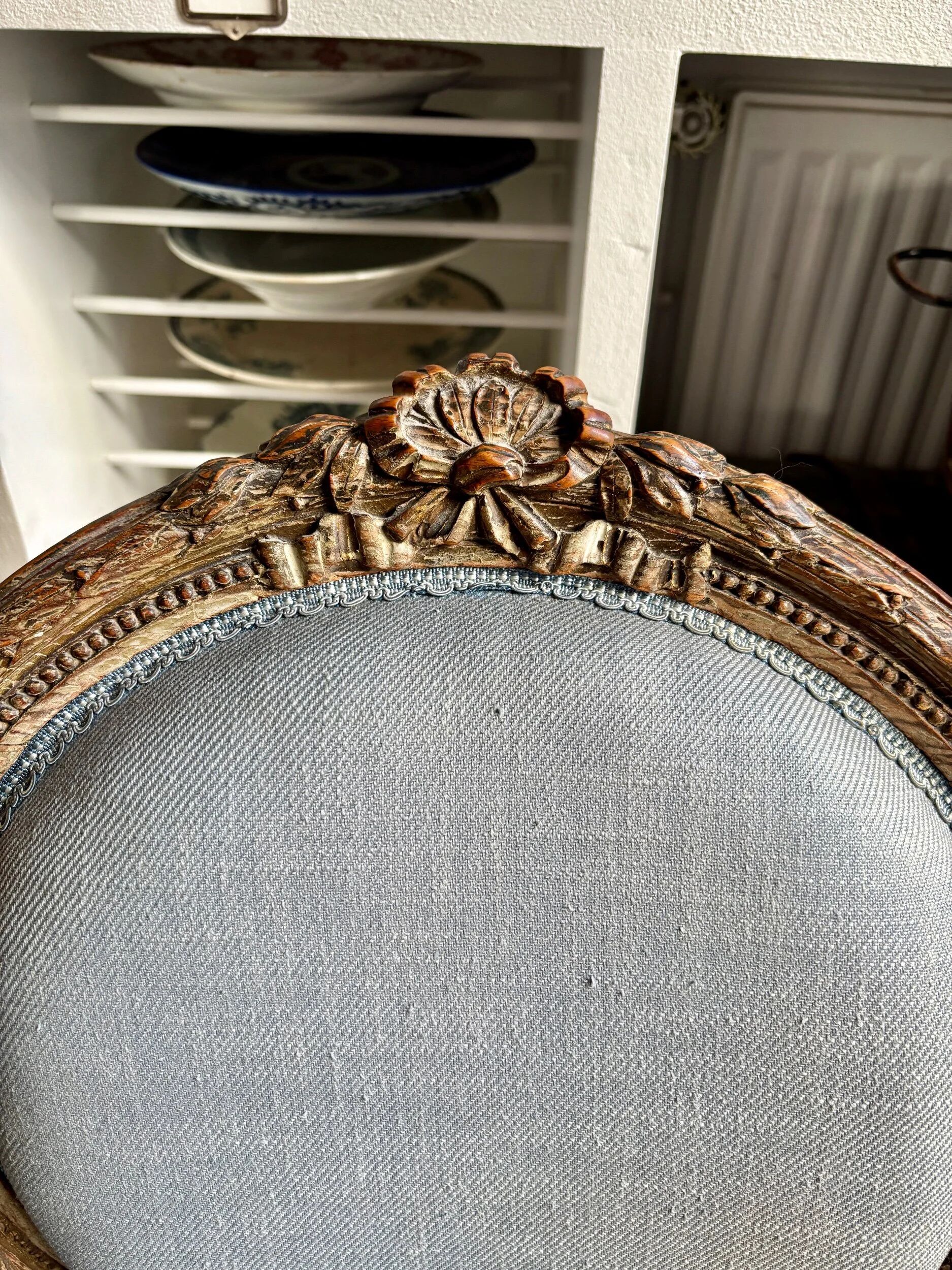 Medallion back chair in reclaimed wood and blue cotton.