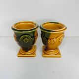 Pair of ocher and green ceramic point-a-line candlesticks