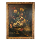 Ecole hollandaise XIXe, huile sur toile. “Bouquet de fleurs sur un entablement”.