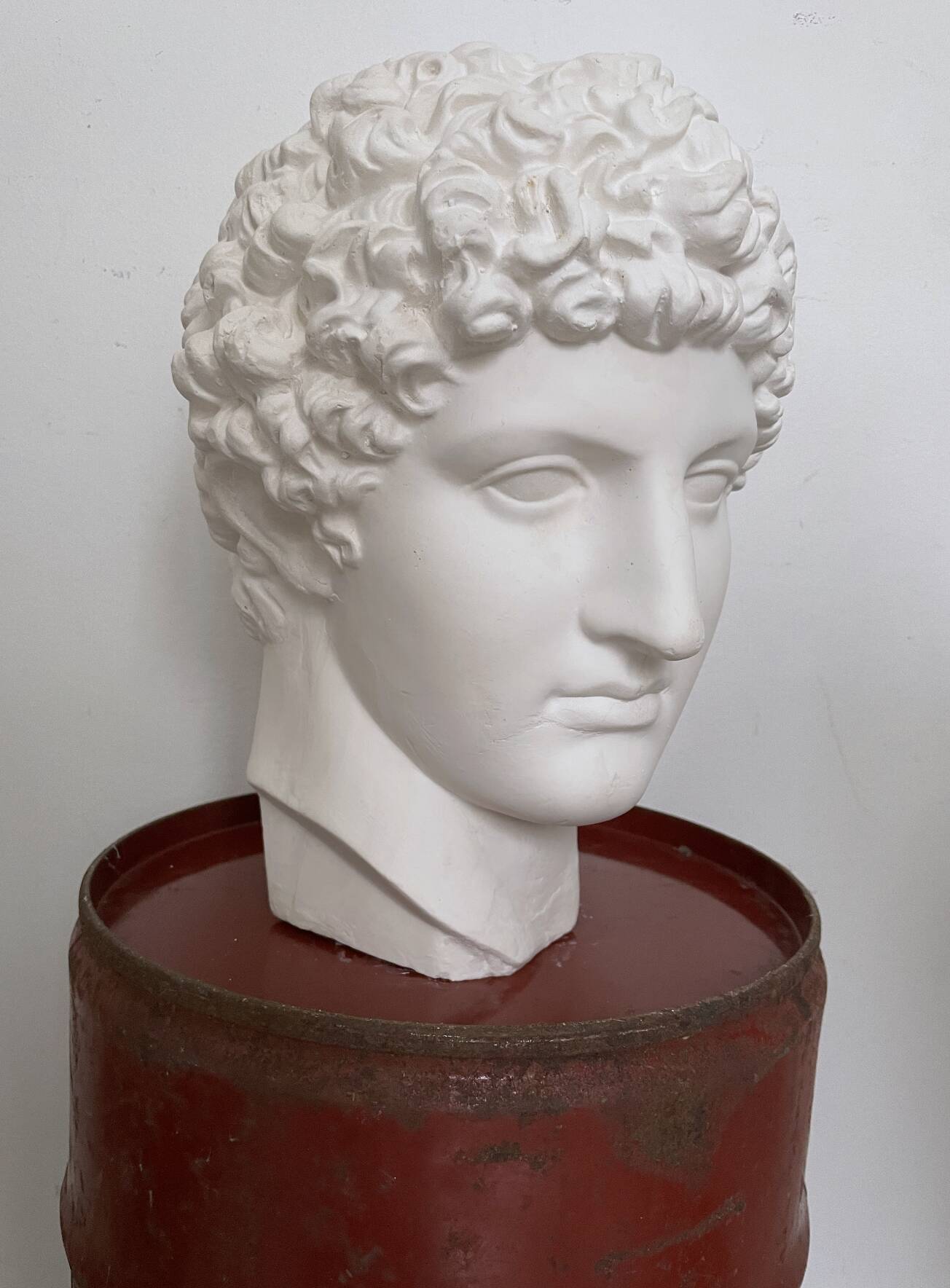 White plaster Greek head