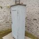 Old patinated bonnet maker