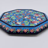 A flat bottom and two enamel bottle bottoms of Longwy