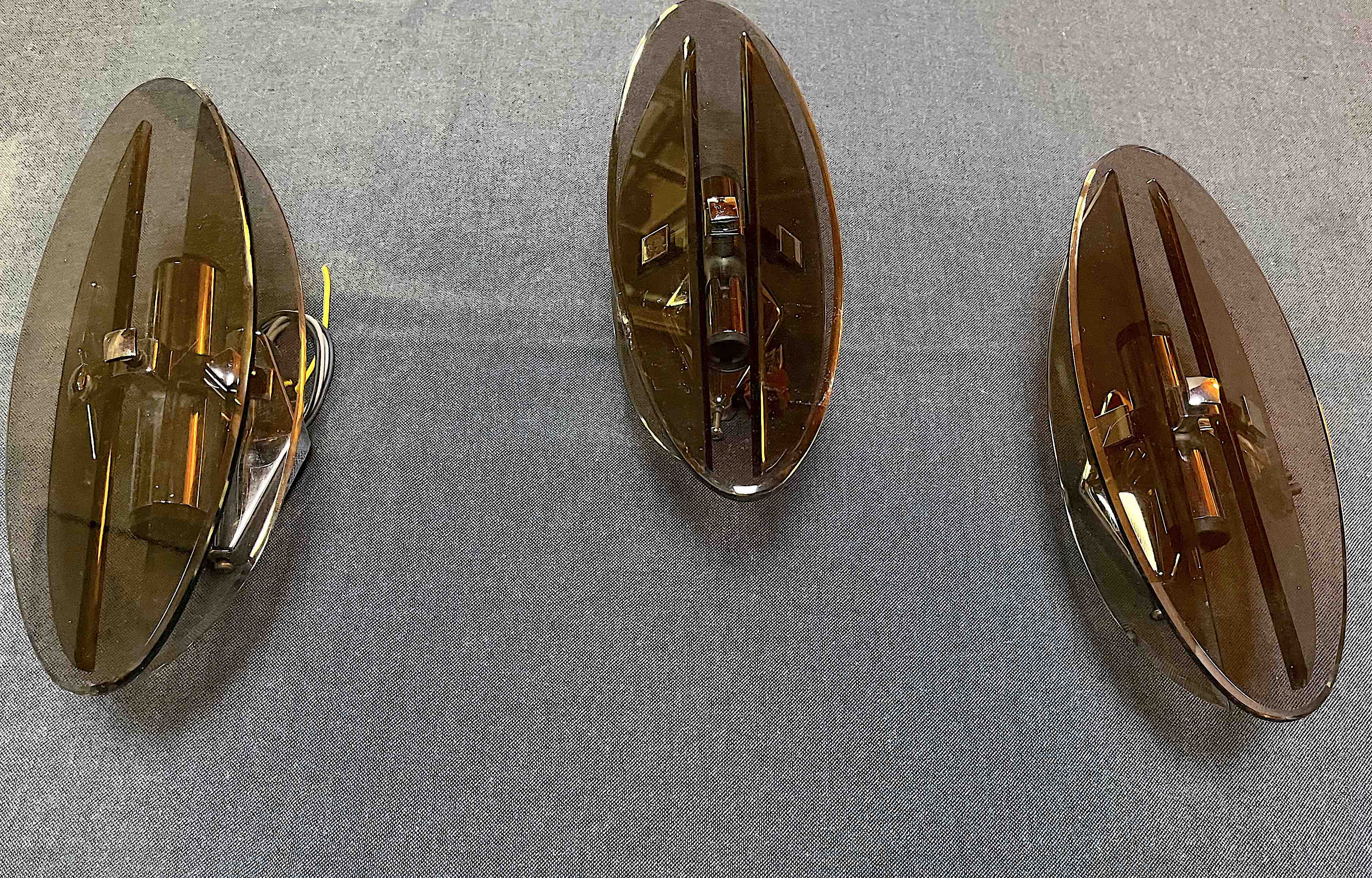 Four Veca wall lights, smoked glass, double light, Italy 1970's