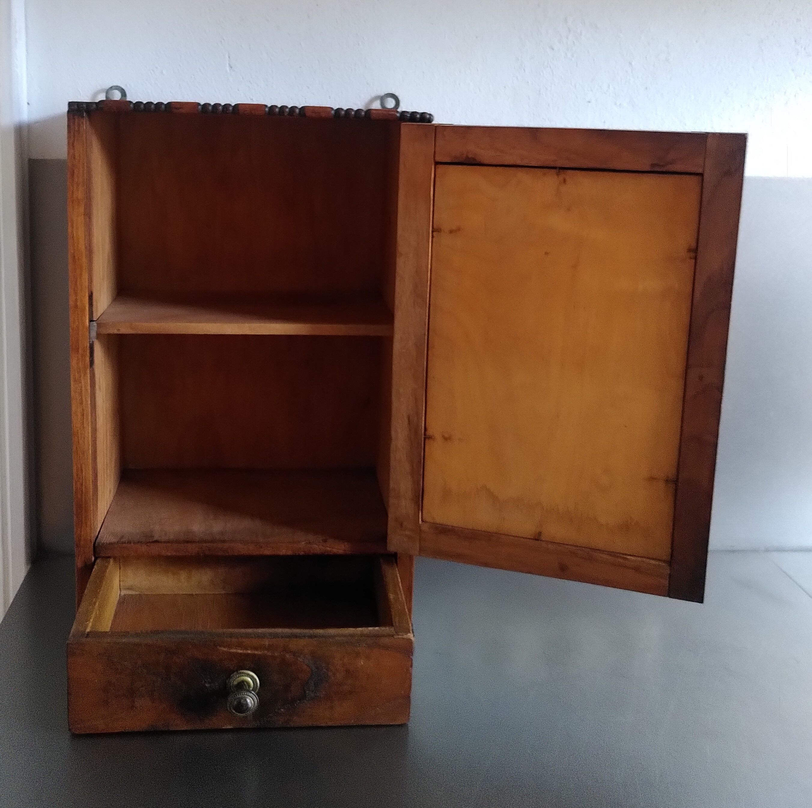 Medicine cabinet with beveled mirror