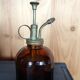 Tinted glass spray bottle