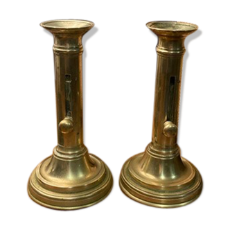 Pair of 19th-century brass pusher candlesticks