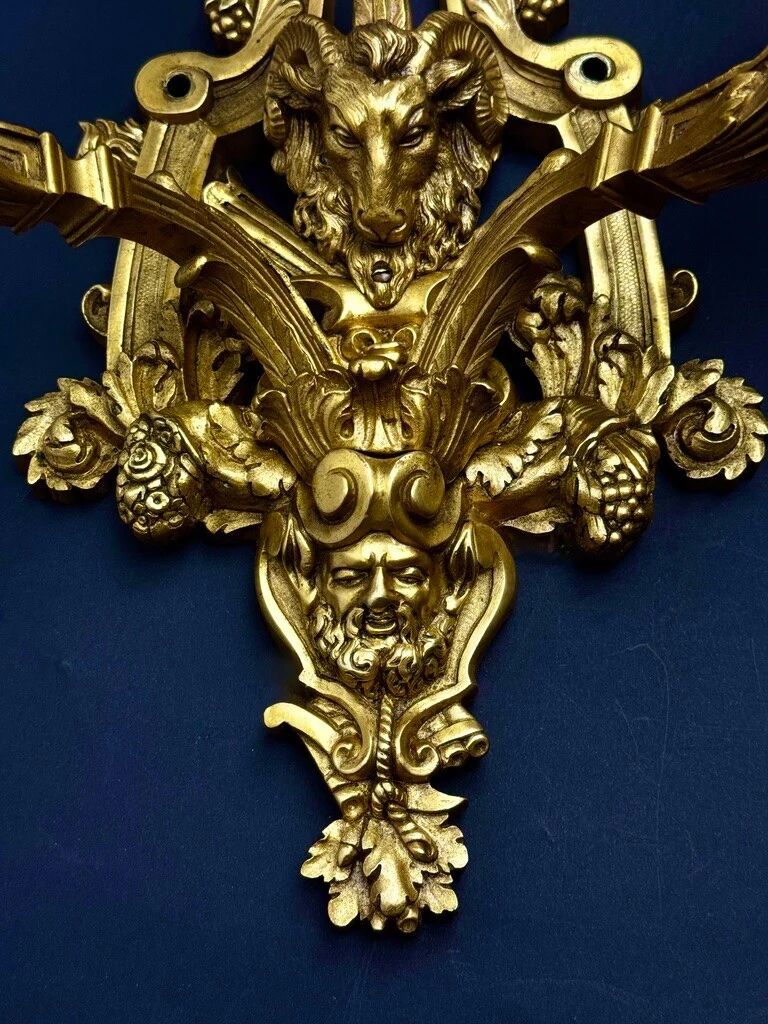A pair of important gilt bronze wall sconces, Louis XVI style, 19th century.