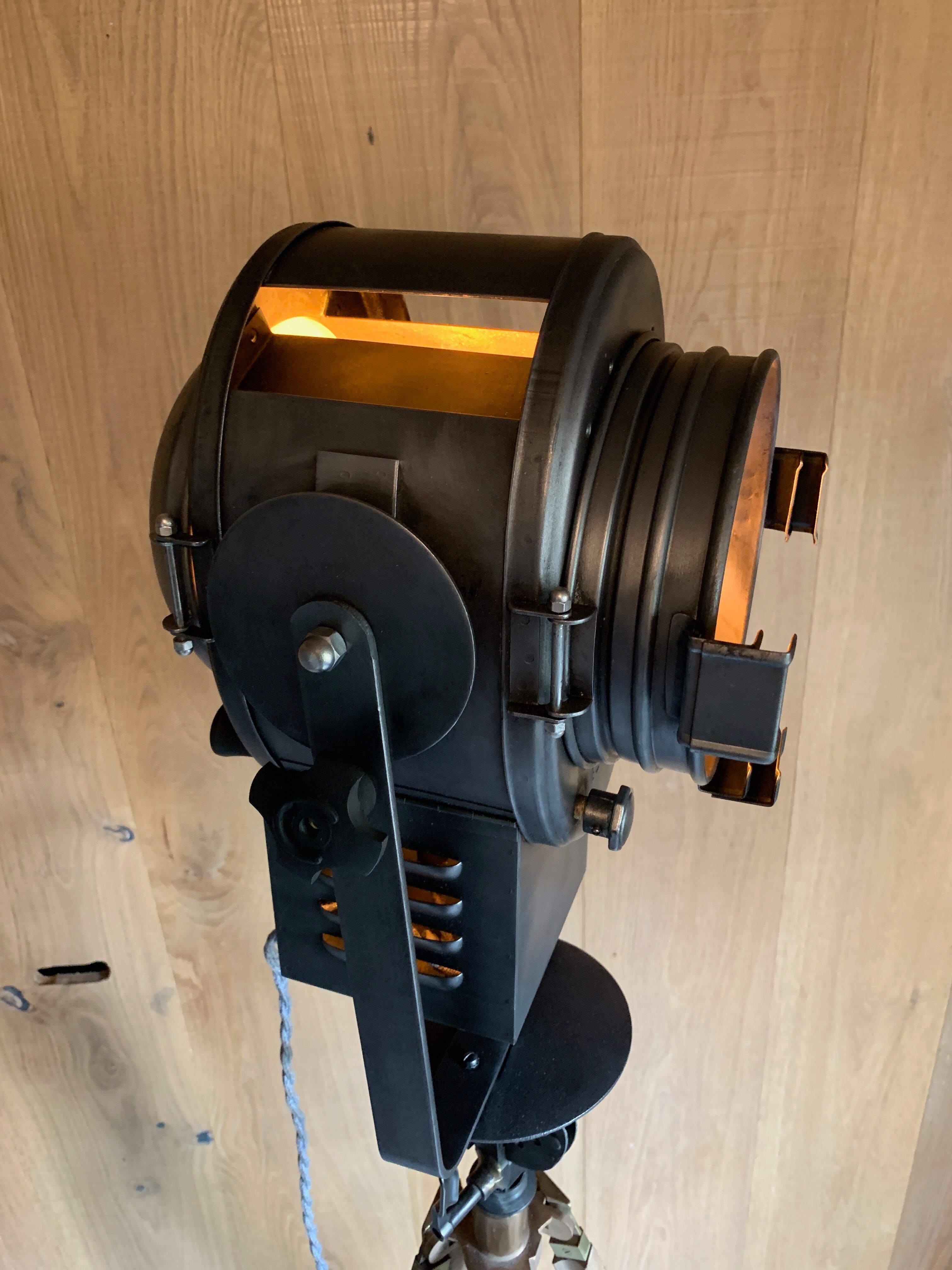 Cinema projector A.E Cremer Paris on its adjustable wooden foot circa 1960