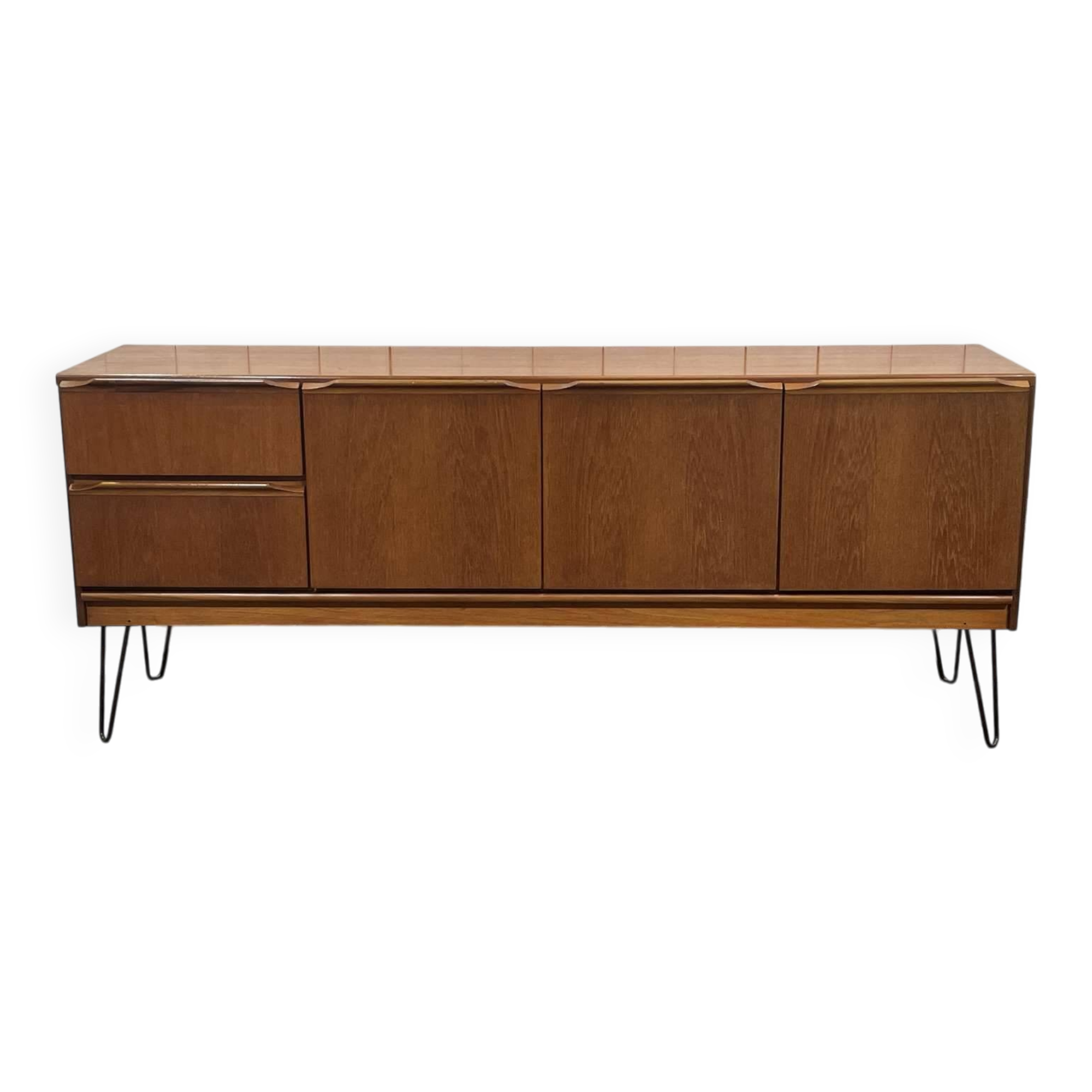 1970s English enfilade in teak with splayed legs.