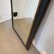 Miroir vintage glace biseautée en bois noir et doré