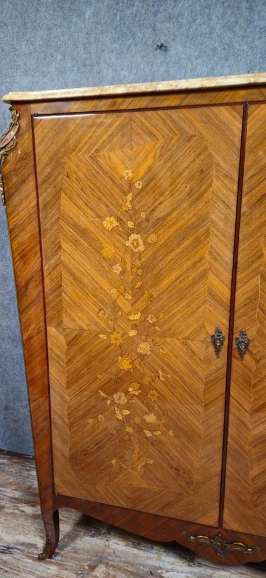 Curved Louis XV style armoire with floral marquetry, 20th century period.