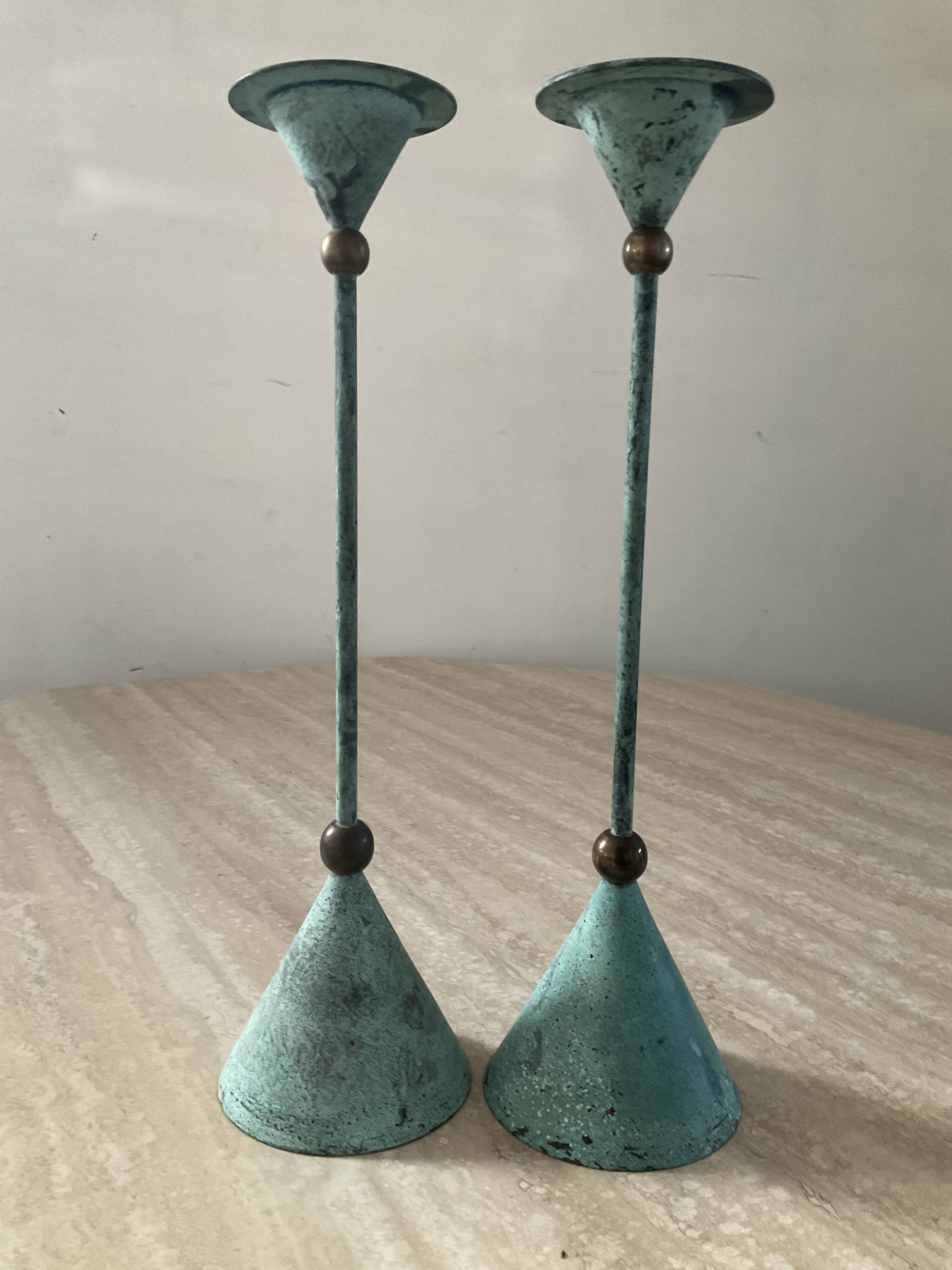 Pair of vintage brass and metal candlesticks