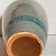 Ceramic vase scarified with gray-blue enamel