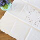 Nappe carrée, brodée, en coton