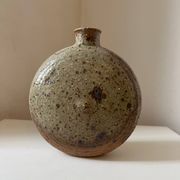 Vintage round, flat-bottomed stoneware bud vase