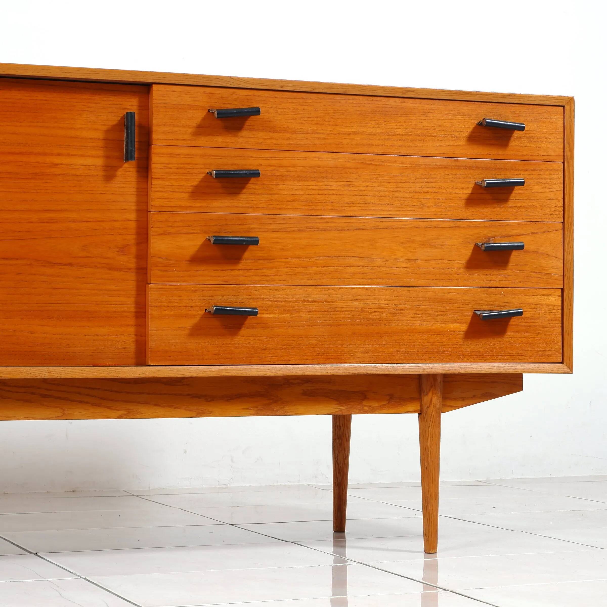 Swedish teak sideboard with leather handles