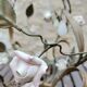 Italian cage chandelier decorated with ceramic roses and glass paste pendants