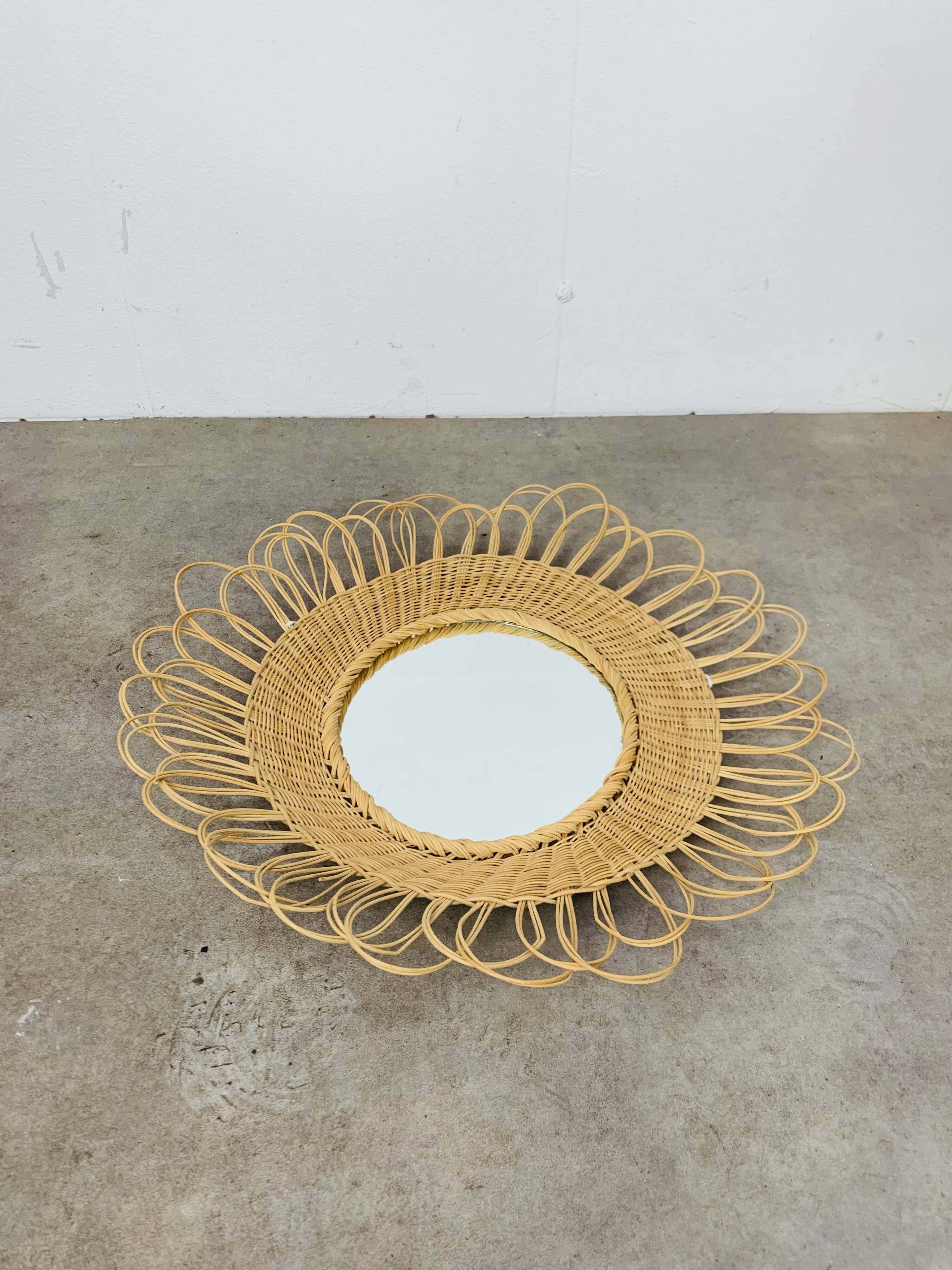 Vintage rattan sun mirror from the 60s