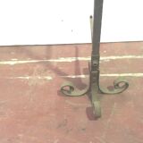 Big in front of hammered iron fireplace