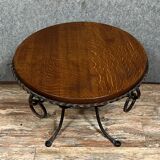Hammered iron coffee table with circular wooden top