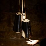 Trio of Raak steel pendant lights, 1960s