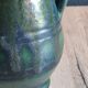Vintage ceramic pitcher vase in glazed green and blue.