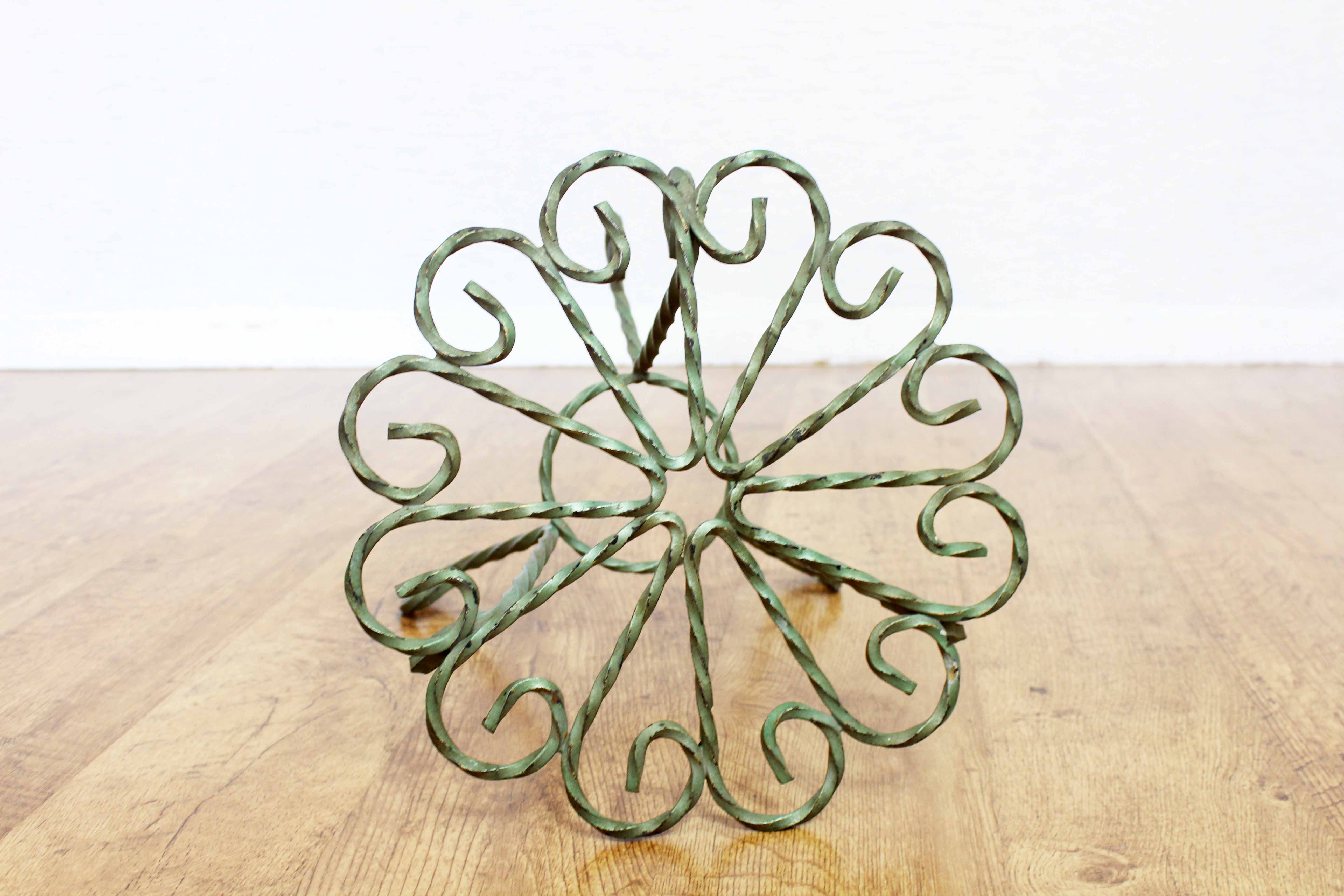 Wrought iron plant holder