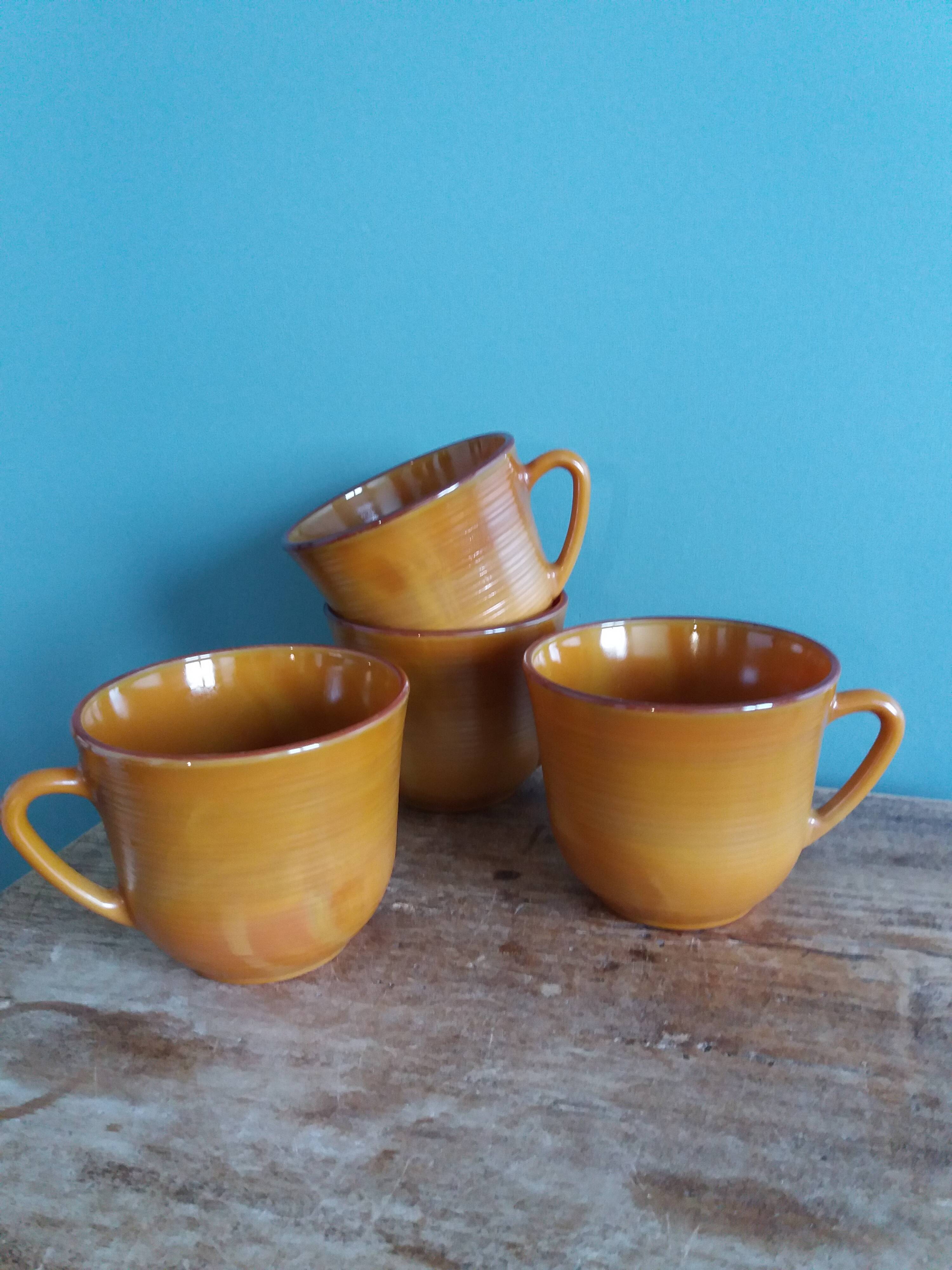 Large Arcopal France Volcan model mugs from 1970, caramel mustard