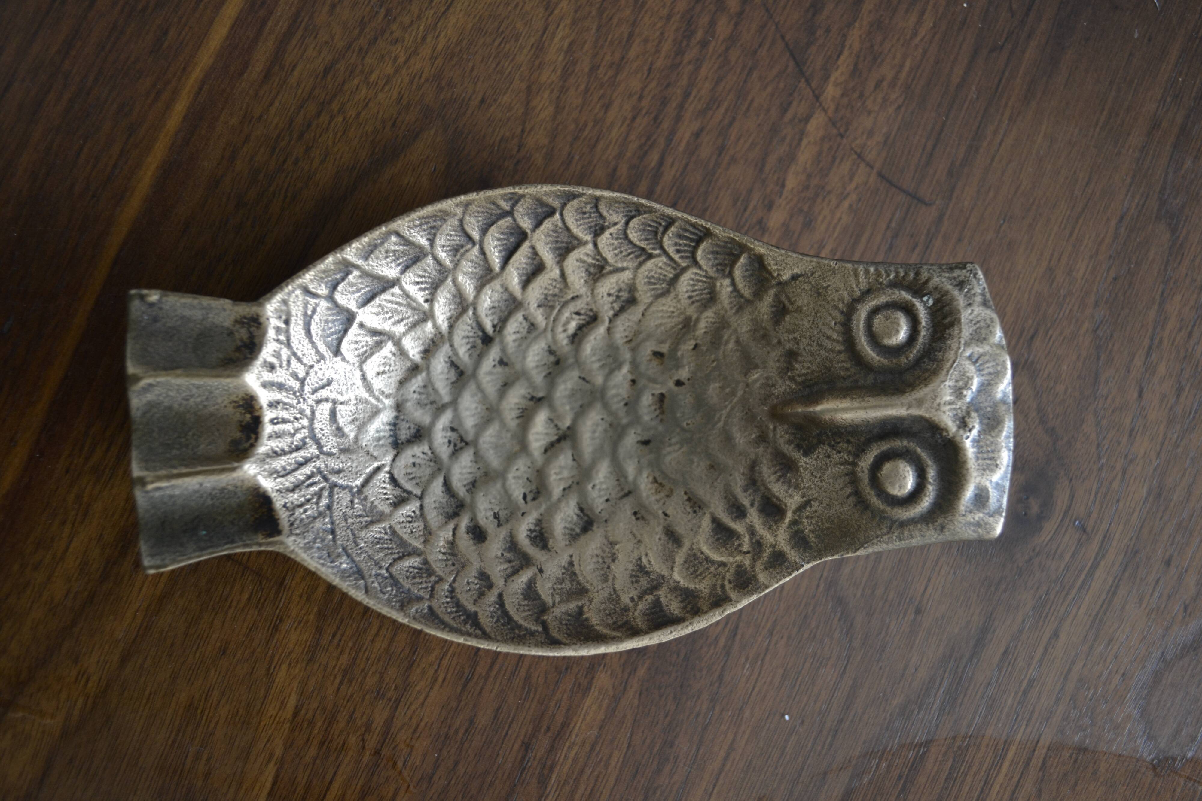 Empty owl brass pocket