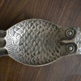 Empty owl brass pocket