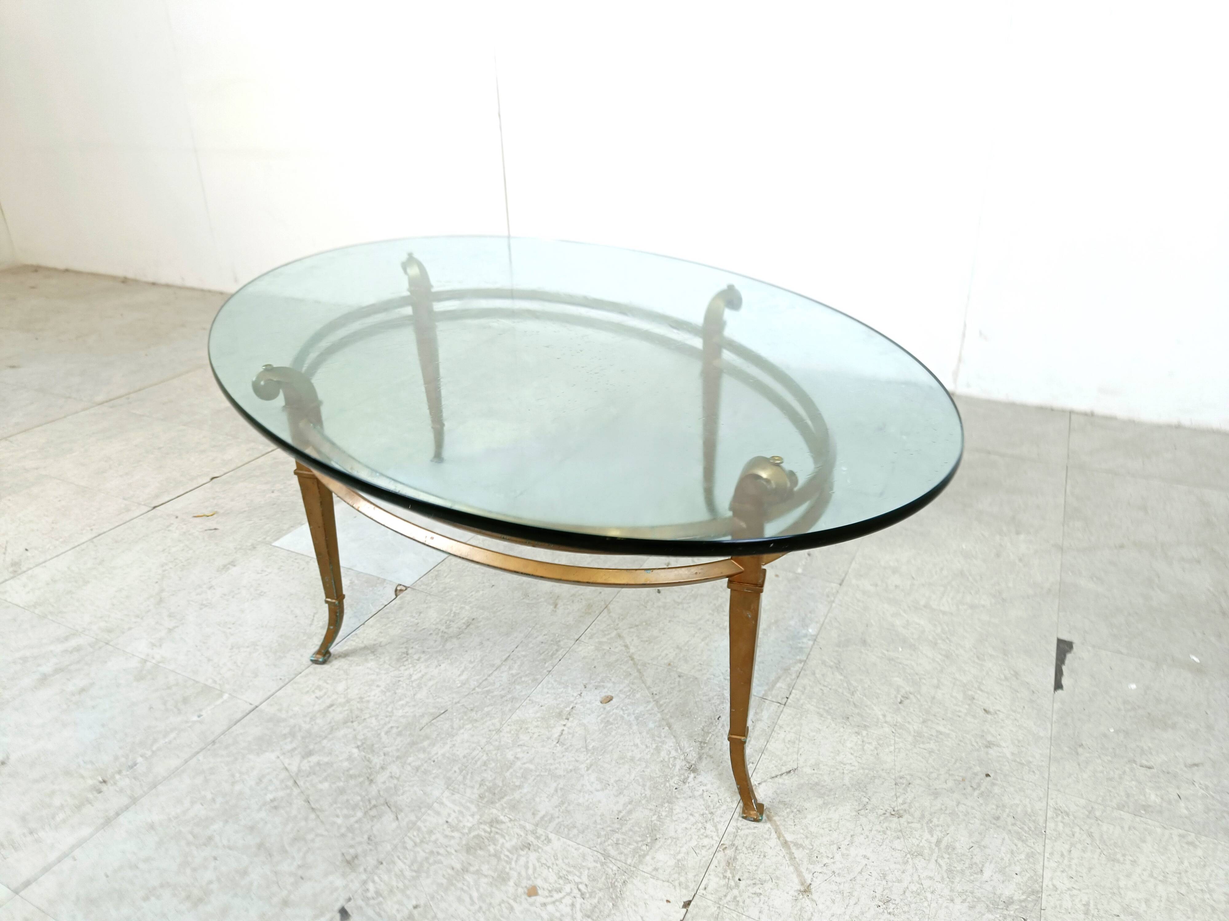 Vintage golden metal and oval glass coffee table, 1970s