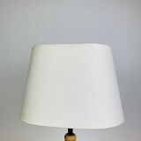 Wrought iron and wood tripod lamp