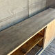 Old counter with sliding doors in raw wood