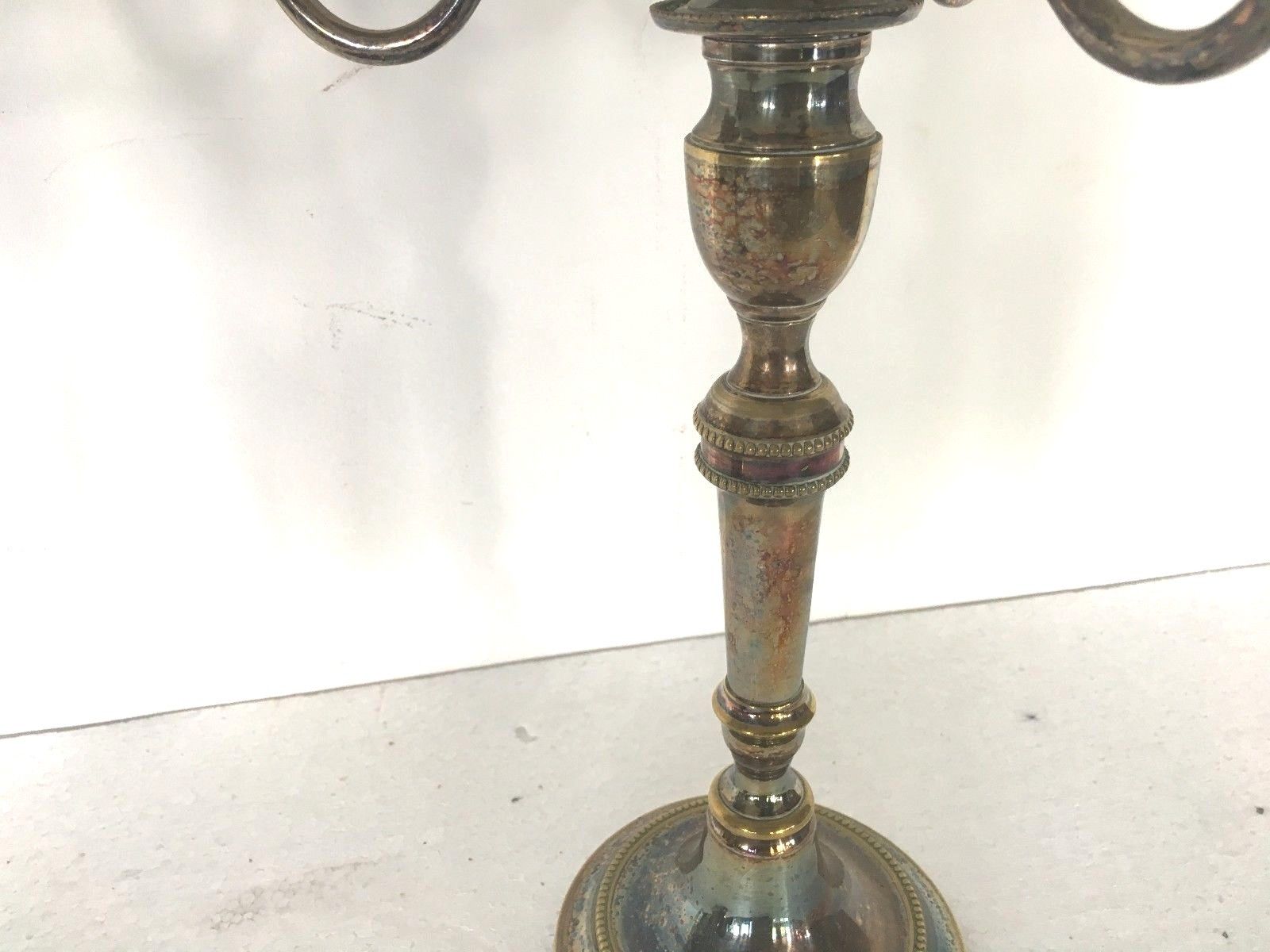 Pair of Louis XVI style in silver bronze candelabra