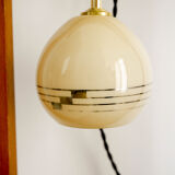 Yellow opaline hand lamp