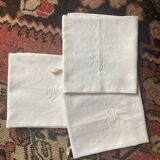 3 white tea towels in damask cotton thread with BN monogram.