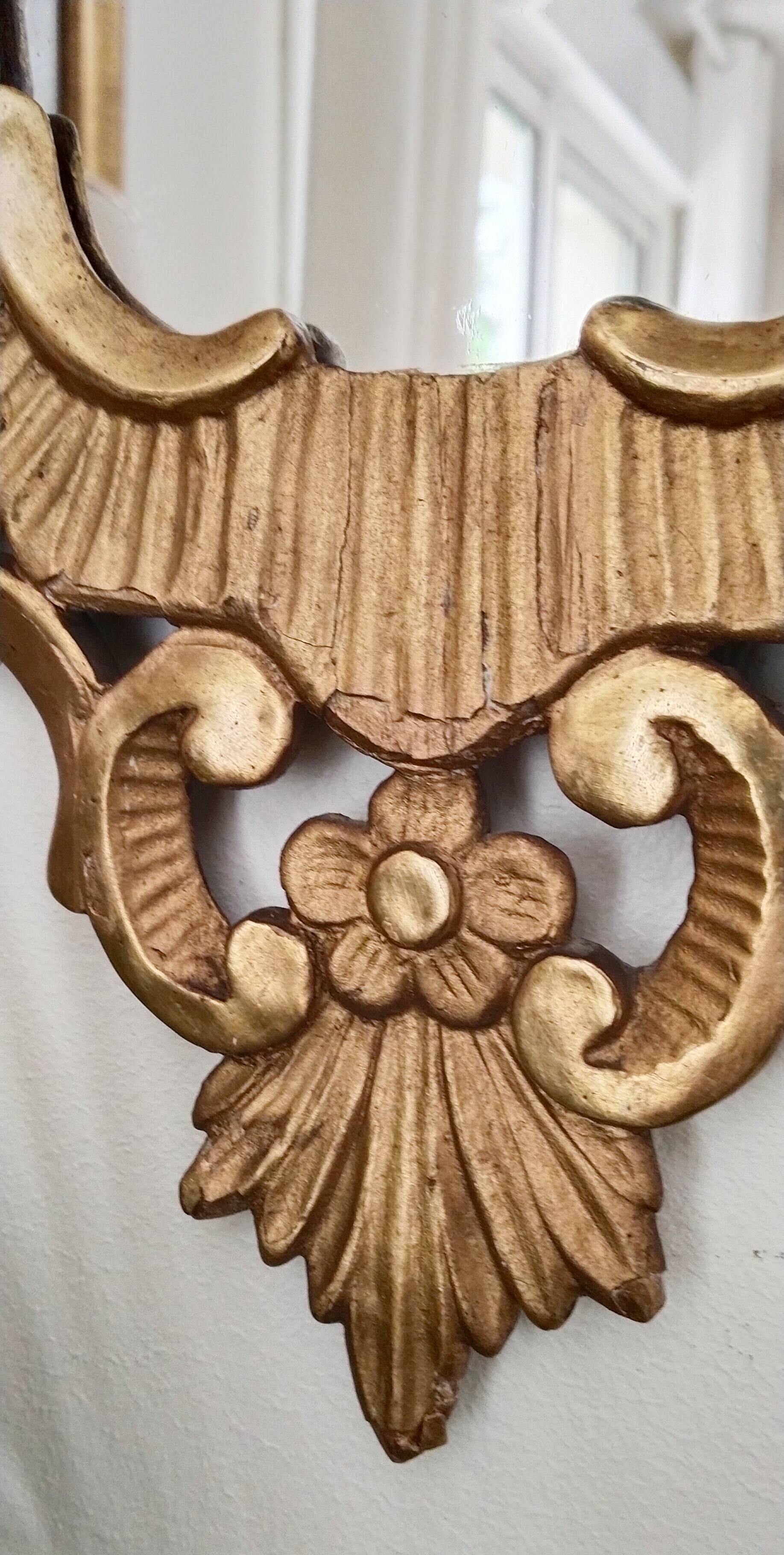 Mirror carved in gilded wood, 19th century