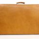 Ensemble de trois valises en cuir vintage