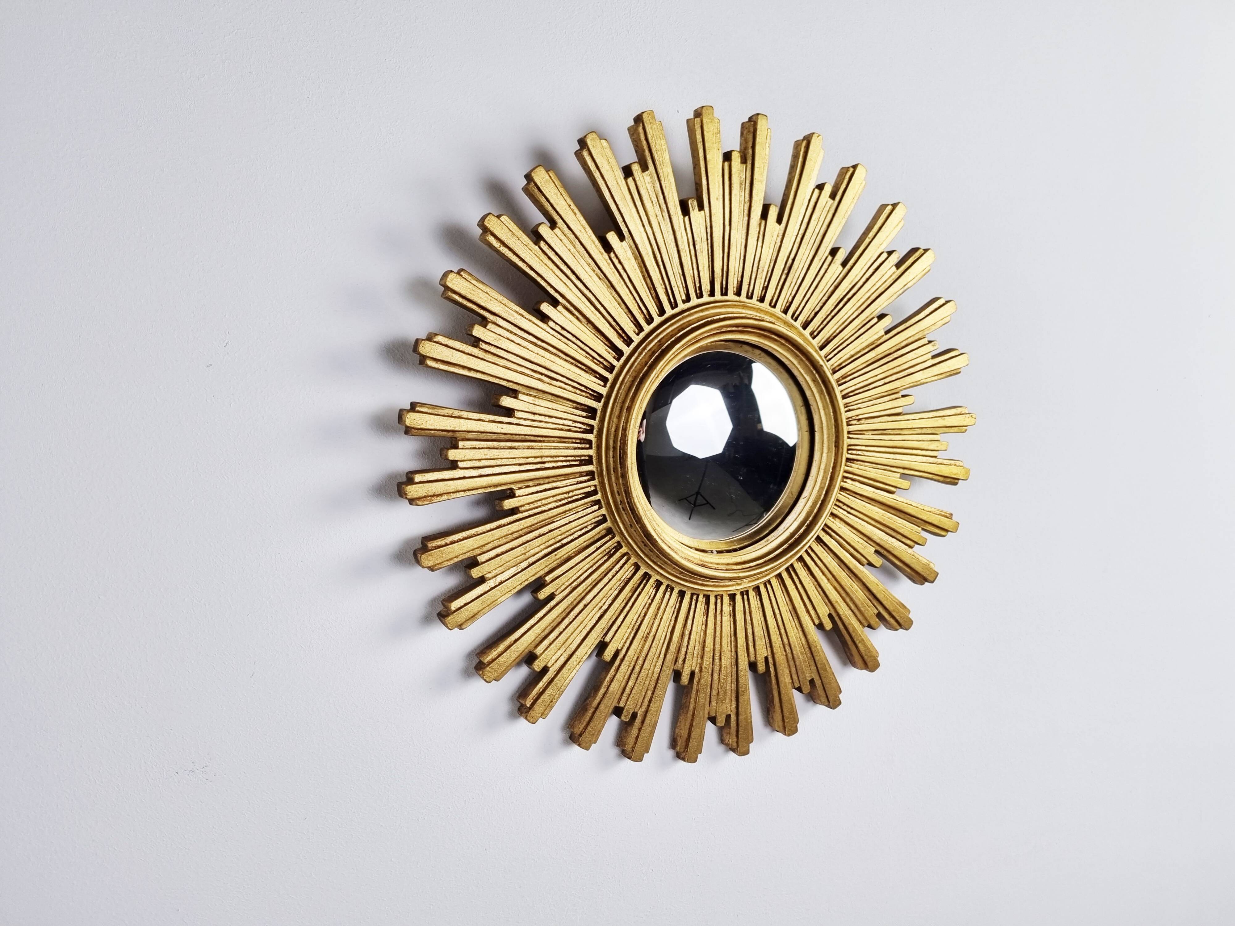 Vintage golden sunburst mirror